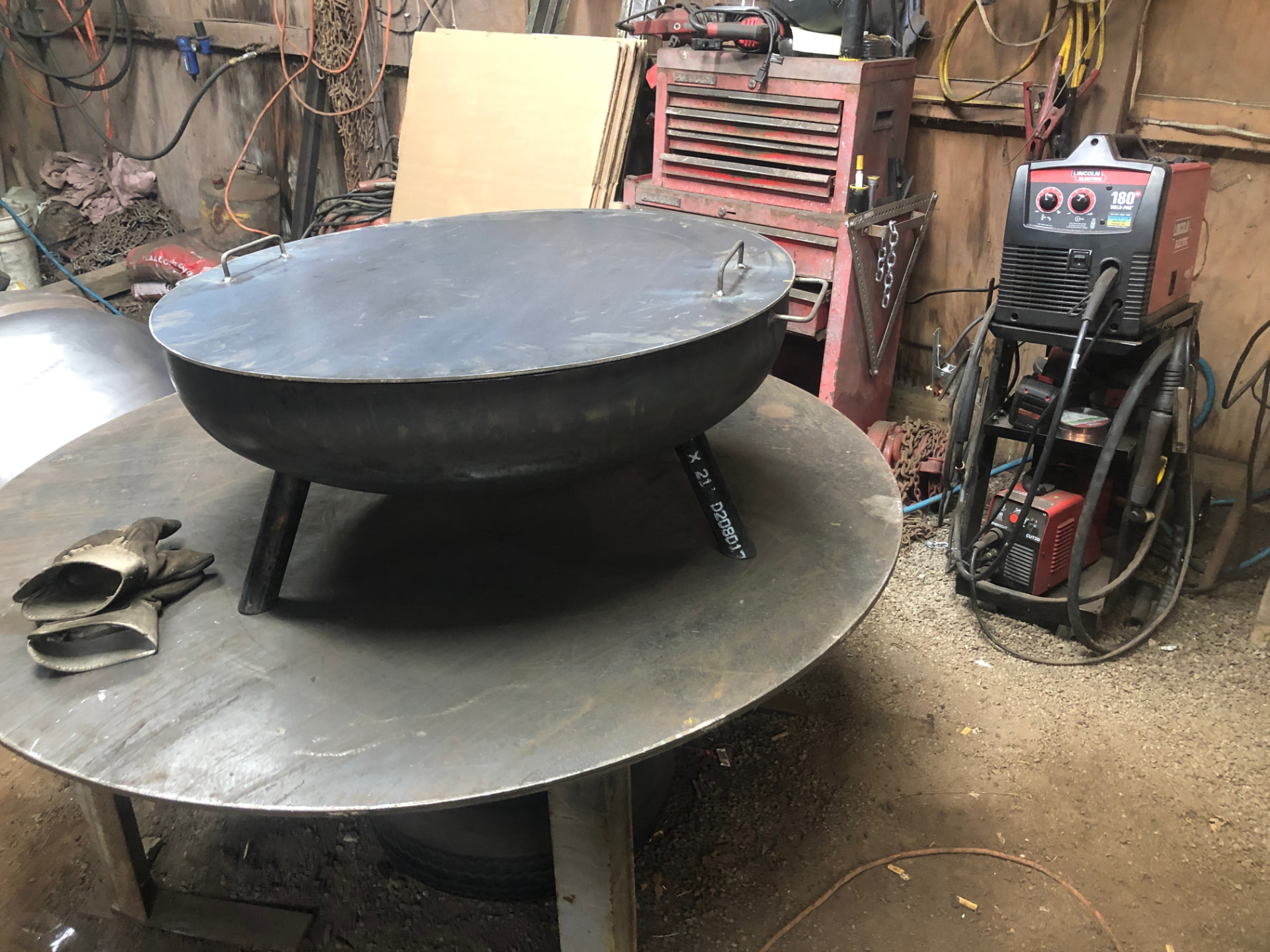 Flat 36" steel fire pit top with welded handles